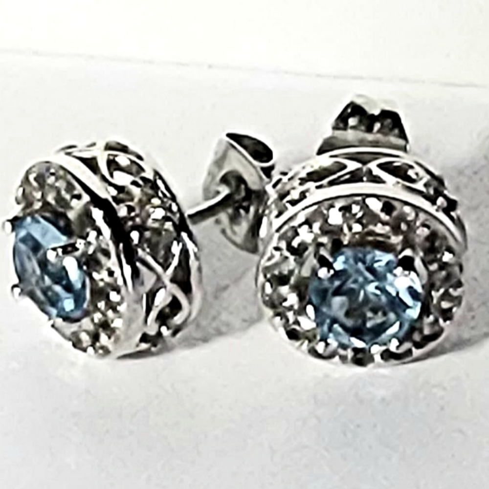 COPY - Sterling silver stud earrings with aquamarine cubic zirconia.